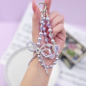 Handmade Women's Pastel Purple Beaded Keychain with Bow